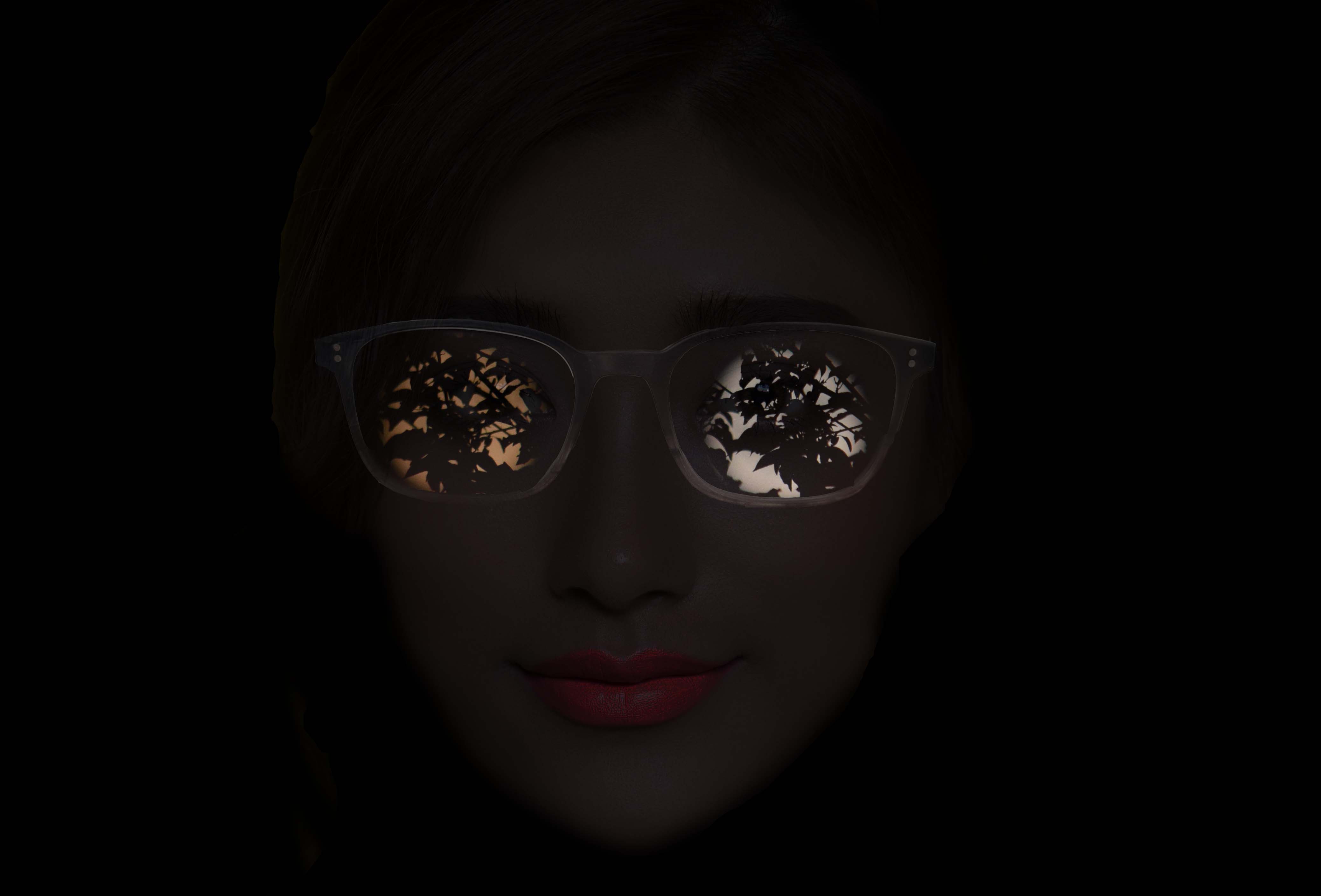 Fotografia in macro di un viticcio con uan spirale all'estremita. lo sfondo è una barra metallica verticale dove il viticcio proietta la sua ombra.